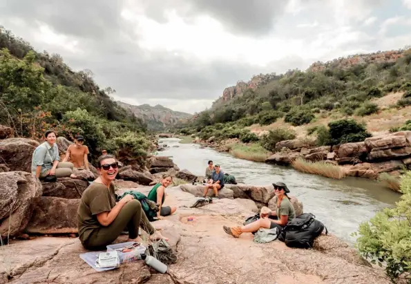  ??  ?? ABOVE Left to right: Dana Martin, Georgina Muirhead, Shara Burger (front), Julie Bryden (back), Angela Morgan, Daniella van Brussel, Trish Scaife and Chloë Cooper having lunch in the Luvuvhu Gorge.