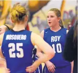  ?? JIM THOMPSON/ JOURNAL ?? Roy/ Mosquero teammates Kylee Lewis, right, and Baylee Horn listen to instructio­ns during a timeout in their state tournament game against Quemado on Wednesday.