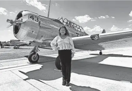  ?? VINCENT T. DAVIS/SAN ANTONIO EXPRESS-NEWS ?? Mariana Lozano, a graduate of the Tuskegee NEXT flight training program, attends San Antonio’s Tuskegee Airmen Commemorat­ion Day ceremony March 28 at Stinson Municipal Airport.