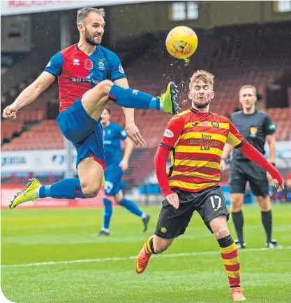  ??  ?? Inverness CT’s Sean Welsh in action against Partick Thistle’s Craig Slater