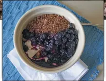  ?? PHOTO BY EMILY RYAN - FOR MEDIANEWS GROUP ?? Bowled over: This granola bowl’s as tasty as it is pretty.