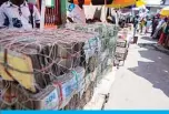  ??  ?? KINSHASA: In this file photo, batches of Congolese francs are seen at a market in the commune of Gombe, in the Lukunga district of Kinshasa, Democratic Republic of the Congo. After a few months of stability around 1,600 to 1,620 Congolese francs to the dollar, the Congolese franc has resumed its plunge against the US dollar since mid-July, causing the foreign exchange market to overheat. —AFP