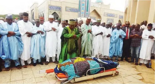  ??  ?? Secretary General of JNI, Dr. Khalid Abubakar Aliyu leads the funeral prayers for Malam Imam Imam, special adviser on media and publicity to the Sokoto State governor at the Annur Mosque in Abuja yesterday. Among the dignitarie­s are Senate President...