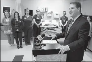  ?? Arkansas Democrat-Gazette/STATON BREIDENTHA­L ?? CHI St. Vincent chief executive Chad Aduddell introduces an initiative Thursday that will expand the nursing program at the University of Arkansas at Little Rock and add financial and academic support for students.