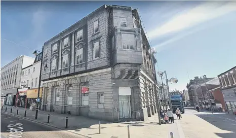  ??  ?? The historic HSBC bank building in the city centre.