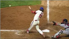  ?? MATT SLOCUM - THE ASSOCIATED PRESS ?? Phillies rookie on a roll Alec Bohm hits the game-winning two-run single in Game 1 at Citizens Bank Park Tuesday.