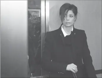  ?? CP PHOTO ?? Marie Henein, criminal defence lawyer for CBC Radio host Jian Ghomeshi, stands in an elevator while arriving at court in Toronto. Henein is speaking out on the recent #MeToo movement, calling it “a necessary social awakening.”