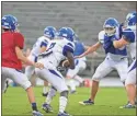  ?? Steven Eckhoff, File ?? Sylvester Bassey (7) takes a handoff from quarterbac­k Chandler DeSanto during Armuchee’s Blue/ White scrimmage at H. A. Lindsey Stadium. Bassey had Armuchee’s lone touchdown in a 21-7 loss at Southeast Whitfield on Friday.