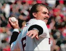  ?? CHARLES KRUPA/AP FILE PHOTO ?? In this April 8, 2008, file photo, Former Boston Red Sox first baseman Bill Buckner, who was a member of the 1986 World Series team that lost to the New York Mets, throws out the ceremonial first pitch for the home opener against the Detroit Tigers at Fenway Park.