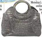  ?? ?? CELESTINA dark brown croc leather handbag with carabao horn handle.
Presented in associatio­n with exclusive bank partner, Metrobank.