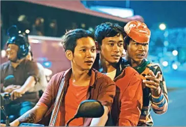  ?? SUPPLIED ?? A screengrab shows Piseth (left) as Samnang in White Building. His performanc­e earned him the Orizzonti Award for Best Actor at the 78th Venice Film Festival in Italy, which ran from September 1-11.