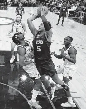  ?? Eric Christian Smith/contributo­r ?? TCU forward Chuck O'bannon Jr. (5) hasn't forgotten the overtime loss to Arizona last year, when he scored a career-high 23 points.