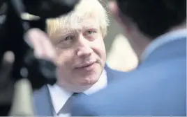 ??  ?? > Foreign Secretary Boris Johnson at Newport Market yesterday