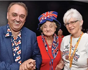  ?? ?? ● John Lewis with Doreen Russell and Eileen Miller. Around 200 local residents from the Borough of Halton attended a tea party for the The Queen’s Platinum Jubilee