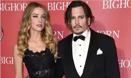  ?? ?? Amber Heard and Johnny Depp in January 2016. Photograph: Jordan Strauss/Invision/AP