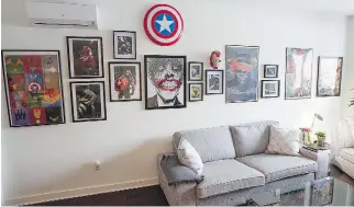  ?? P H O T O S : P I E R R E O B E N D R AU F ?? The living room wall is filled with drawings of comic book superheroe­s in the condo of Adam Bruno located in Montreal. He also collects action figures.