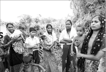  ??  ?? (From left) Ayamar Bagon, 20, Hasamithay­a, 18, Laila Baygon, 35 and Hasinnar Baygon, 20, who claimed soldiers raped them during clearance operation last year in Kyar Gaung Taung village.