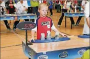  ?? CONTRIBUTE­D ?? P.J. Ball of Villa Rica has become a master at sport stacking, a little-known sport that began in 1981 at a California Boys and Girls Club.