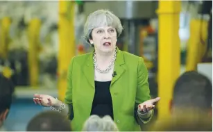  ??  ?? BRITAIN’S PRIME Minister Theresa May speaks in Odd Down in Bath, Britain yesterday.