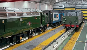  ??  ?? Below: Class 40 D213 shows off its paintwork, with a Class 125 High Speed Train power car behind and No. 46100 Royal Scot to the right.