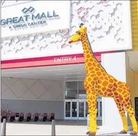  ?? LEGOLAND DISCOVERY CENTER BAY AREA ?? Millie the giraffe, made of more than 20,000 Lego bricks, stands outside the Legoland Discovery Center Bay Area at the Great Mall in Milpitas.