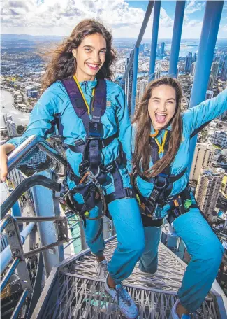  ?? Picture: Nigel Hallett ?? HIGH CLIMBERS: Sisters Holly and Allie Brown do the Skypoint climb.
