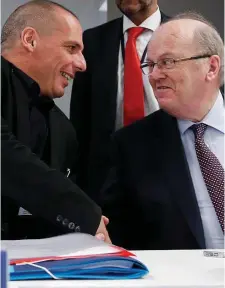  ??  ?? Greek Finance Minister Yanis Varoufakis shakes hands with Michael Noonan ahead of the meeting in Luxembourg yesterday