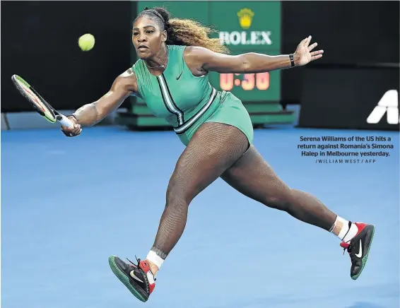  ?? /WILLIAM WEST / AFP ?? Serena Williams of the US hits a return against Romania's Simona Halep in Melbourne yesterday.