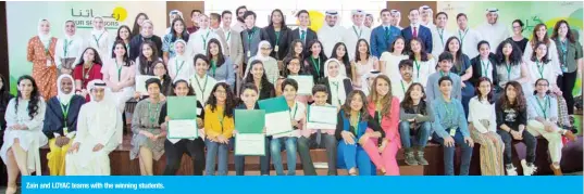  ??  ?? Zain and LOYAC teams with the winning students.