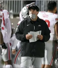  ?? ASSOCIATED PRESS FILE PHOTO ?? Ryan Day will coach Ohio State in the Big Ten Championsh­ip after all. The conference waived its six-game minimum rule Wednesday, allowing the Buckeyes to compete for the title.