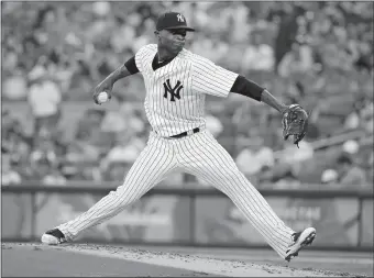  ?? SETH WENIG/AP PHOTO ?? Domingo German allowed only two hits over a career-high seven innings as the Yankees defeated the Seattle Mariners 7-2 on Tuesday night at Yankee Stadium.