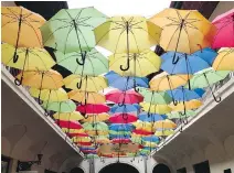  ??  ?? Colourful umbrellas are creatively suspended over an arcade in Kosice’s town centre, a medieval downtown with modern touches.