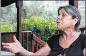  ?? Michael Quine ?? Las Vegas Review-journal @Vegas88s Trout Canyon homeowner Donna Lamm talks about the 2013 Carpenter 1 Fire and the difficulti­es property owners in the canyon have faced.
