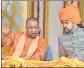  ?? ?? CM Yogi Adityanath and Union I&B minister Anurag Thakur.