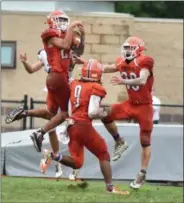  ?? BARRY TAGLIEBER - FOR DIGITAL FIRST MEDIA ?? Perk Valley’s Austin Rowley, Malik Smith (9) and Zach Lomonaco, right, break up a pass for Pennridge’s Ryan Garner at the end of the first half Saturday.