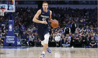  ?? TONY GUTIERREZ — THE ASSOCIATED PRESS ?? Guard Ryan Broekhoff, seen playing for the Dallas Mavericks in a game last November, will have a chance to insert himself to the shuffle on the perimeter when the Sixers convene training camp next week ahead of the Orlando restart.