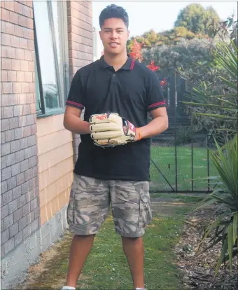  ??  ?? Fifteen-year-old Jachan Roberts stands ready for a throw at home in Woodville. He can’t wait to represent NZ in the U15 Developing Sox in Cairns this week.