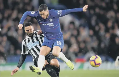  ??  ?? Chelsea’s Eden Hazard jumps over a challenge during the Premier League match at Stamford Bridge, London. PRESS ASSOCIATIO­N Photo. Picture