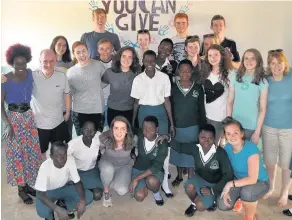  ??  ?? Helping hands Duncanrig Secondary pupils and staff on a previous trip to Uganda