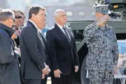  ?? [BLOOMBERG PHOTO BY KIYOSHI OTA] ?? Vice President Mike Pence inspects a Japan self-defense force intercepto­r at the Ministry of Defense in Tokyo on Feb. 7.