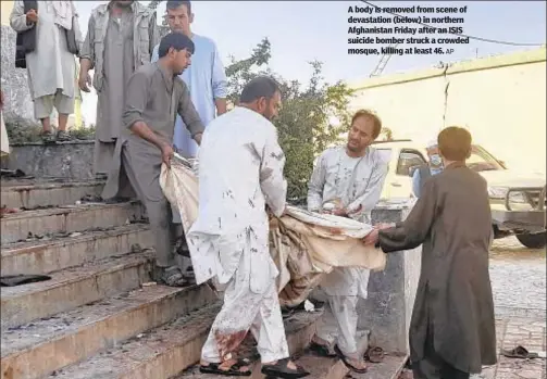  ?? AP ?? A body is removed from scene of devastatio­n (below) in northern Afghanista­n Friday after an ISIS suicide bomber struck a crowded mosque, killing at least 46.