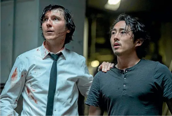  ??  ?? Steven Yeun, right, plays K, part of the Animal Liberation Front lead by Paul Dano’s Jay.