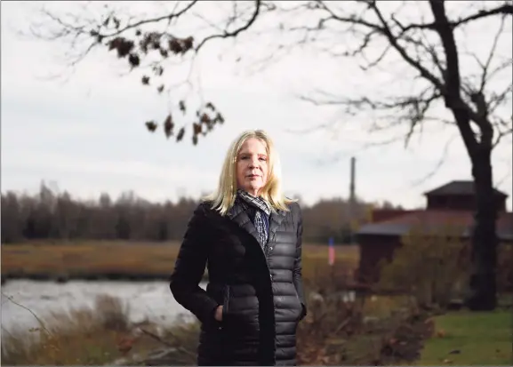  ?? Tyler Sizemore / Hearst Connecticu­t Media ?? Dede Yoder stands outside her home in Norwalk. Yoder’s son, Chris, died in 2017, at age 21, of an overdose of fentanyl and carfentani­l. Yoder said that he was prescribed OxyContin when he was a teenager, and she believes his OxyContin use led to him later becoming addicted to heroin.