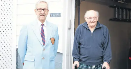  ?? GLEN WHIFFEN/THE TELEGRAM ?? Korean War veteran 90-year-old Doug England (left) was one of several Branch 1, Royal Canadian Legion members who turned up Friday evening to wish Second World War Navy veteran Bill Saunders a happy birthday at his St. John’s home. Saunders turned 99 on Friday.