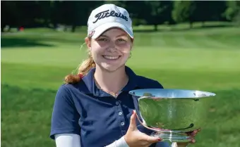  ?? PHOTO COURTESY OF DAVID COLT PHOTOGRAPH­Y ?? UNMATCHED SUMMER: Angela Garvin of Agawam poses with the trophy after winning the 116th Massachuse­tts Women’s Amateur yesterday.