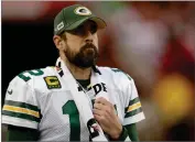  ?? AP PHOTO BY BEN MARGOT ?? In this Jan. 19 file photo, Green Bay Packers quarterbac­k Aaron Rodgers (12) watches from the sideline during the first half of the NFL NFC Championsh­ip football game against the San Francisco 49ers in Santa Clara, Calif. Some players surely flourished and others most certainly floundered when the COVID-19 crisis forced teams to replace their regular offseason programs with virtual OTAS and videoconfe­rence.