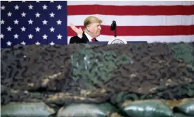  ??  ?? Trump on an unannounce­d visit to Bagram air base in Afghanista­n last year. Trump has consistent­ly displayed a cavalier attitude to armed forces’ lives. Photograph: Tom Brenner/ Reuters