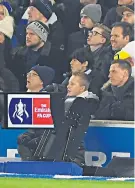  ??  ?? Focus on action: Fans watch the game as the VAR replay box remains unused