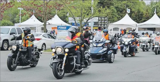  ?? ASHLEY FITZPATRIC­K/THE TELEGRAM ?? Participan­ts with the 2016 Avalon Motorcycle Ride for Dad leave the Newfoundla­nd Power parking lot on Kenmount Road in St. John’s.