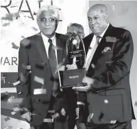  ??  ?? Hayleys PLC Chairman Mohan Pandithage accepting the Grand Slam Award at last year’s competitio­n